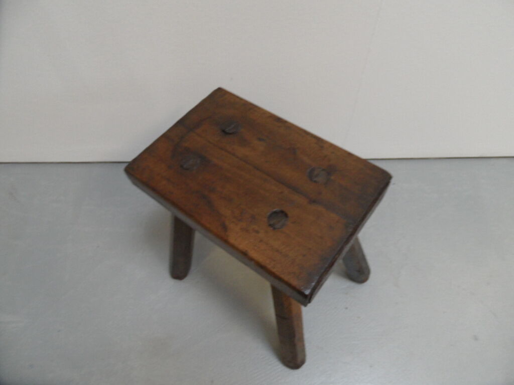 Antique milk stool