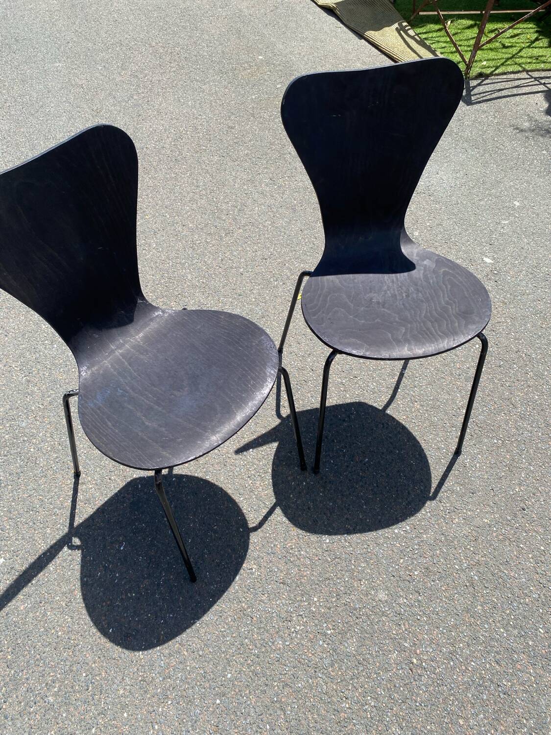 Pairs of wooden chairs