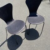 Pairs of wooden chairs