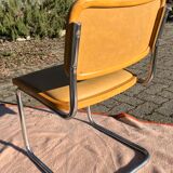 Pair vintage sled reception chairs
