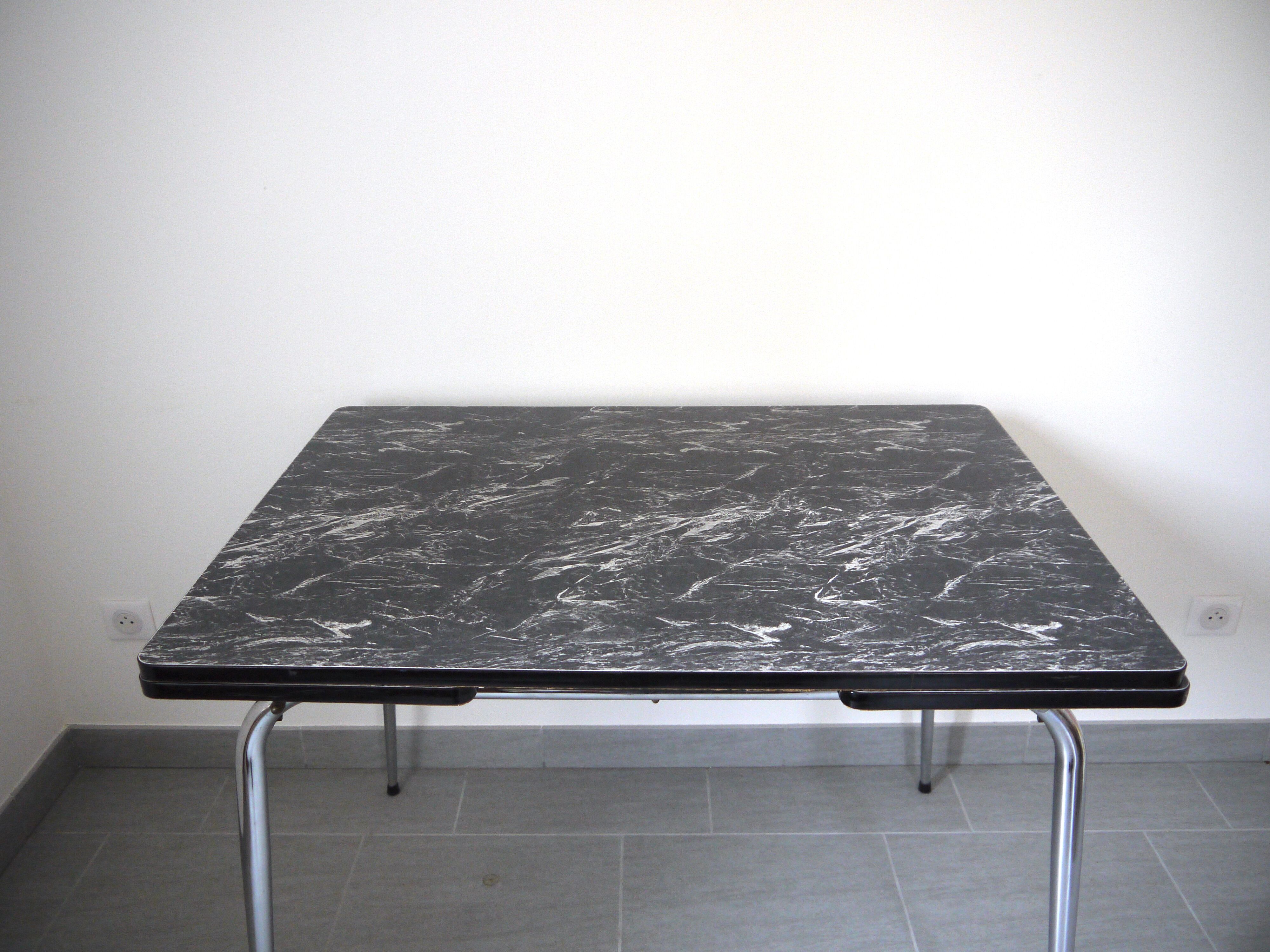 Black and white marbled formica table
