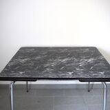 Black and white marbled formica table