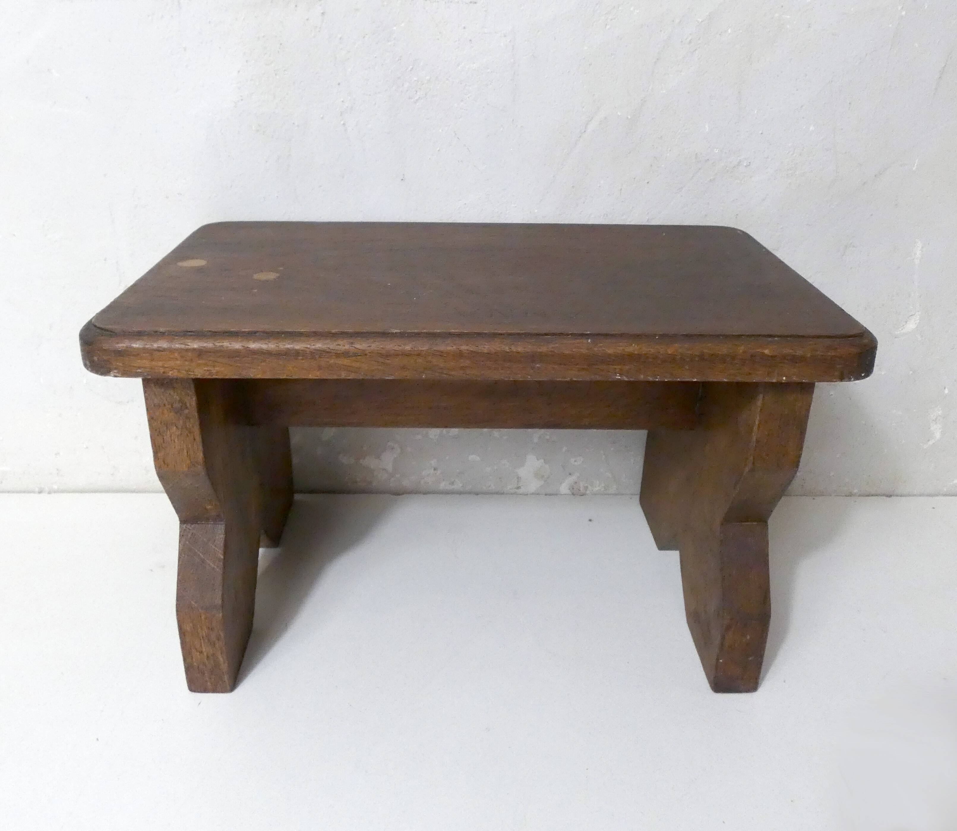 Old small bench in solid oak wood vintage step stool
