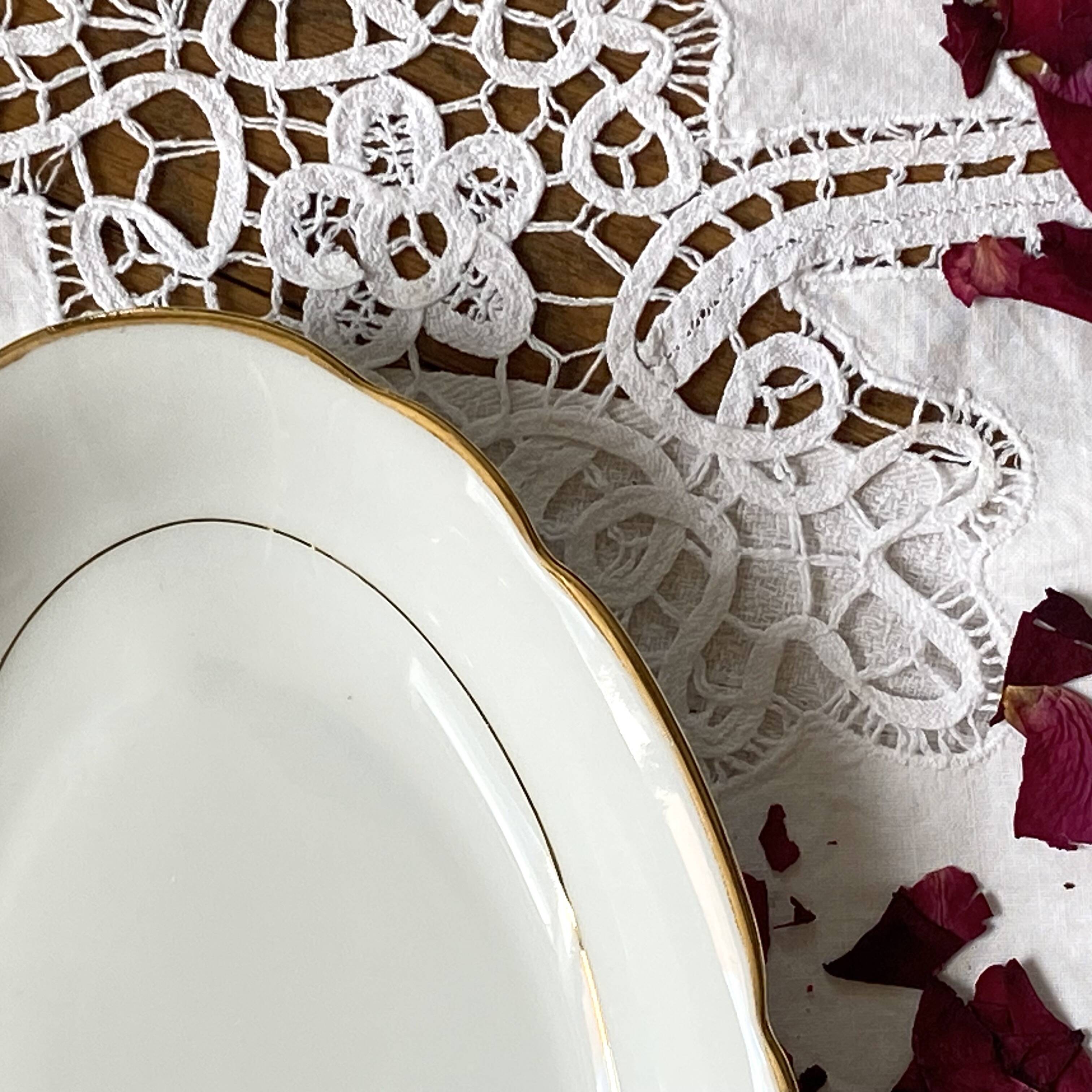 Set of 2 small dishes with gilding, Sologne Lamotte porcelain