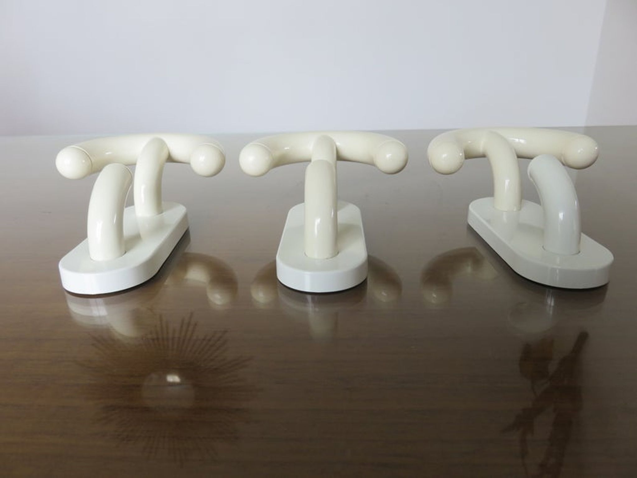 Luigi Caramella's series of 3 patères for " Con & Con " Itay era Memphis 80s