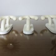 Luigi Caramella's series of 3 patères for " Con & Con " Itay era Memphis 80s