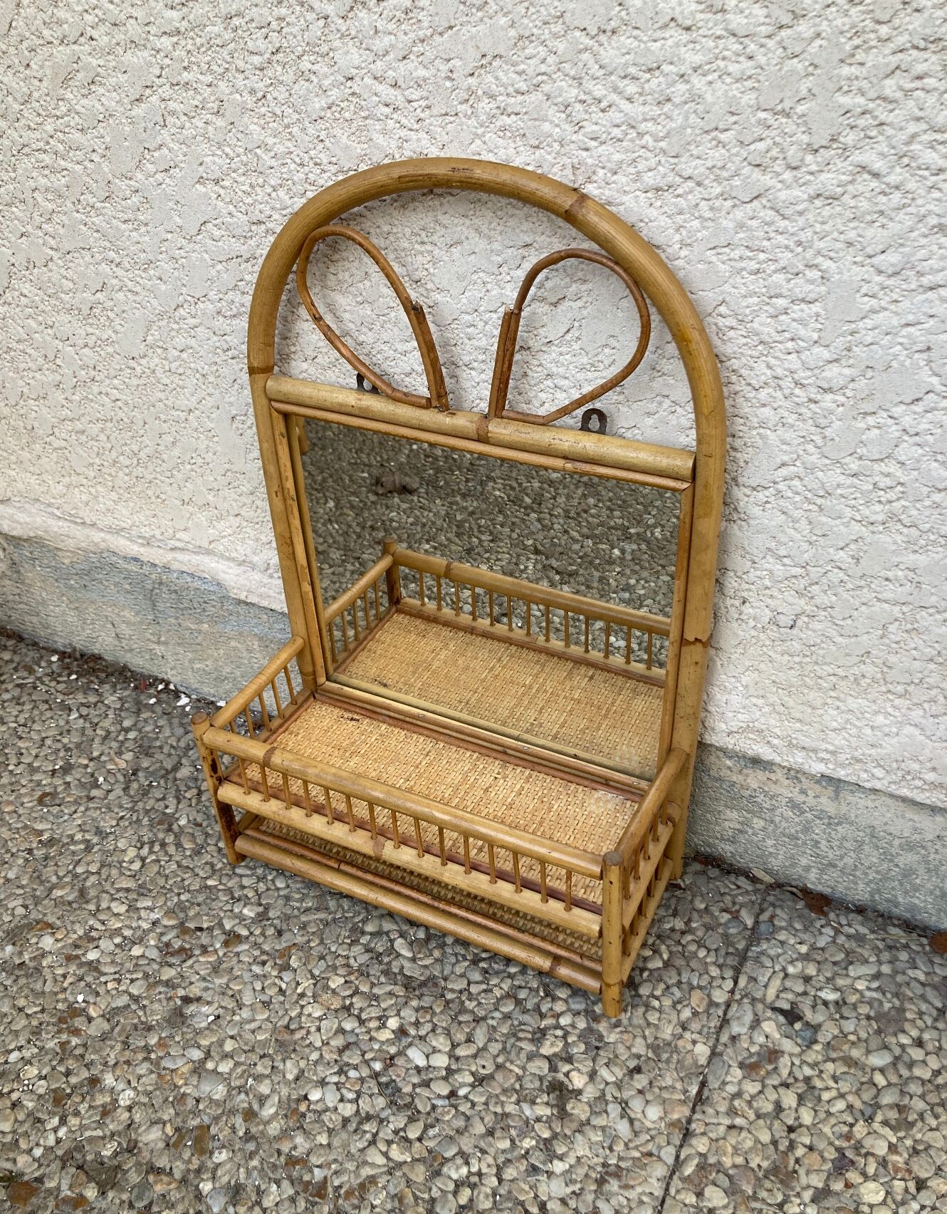 Vintage rattan wall shelf with mirror