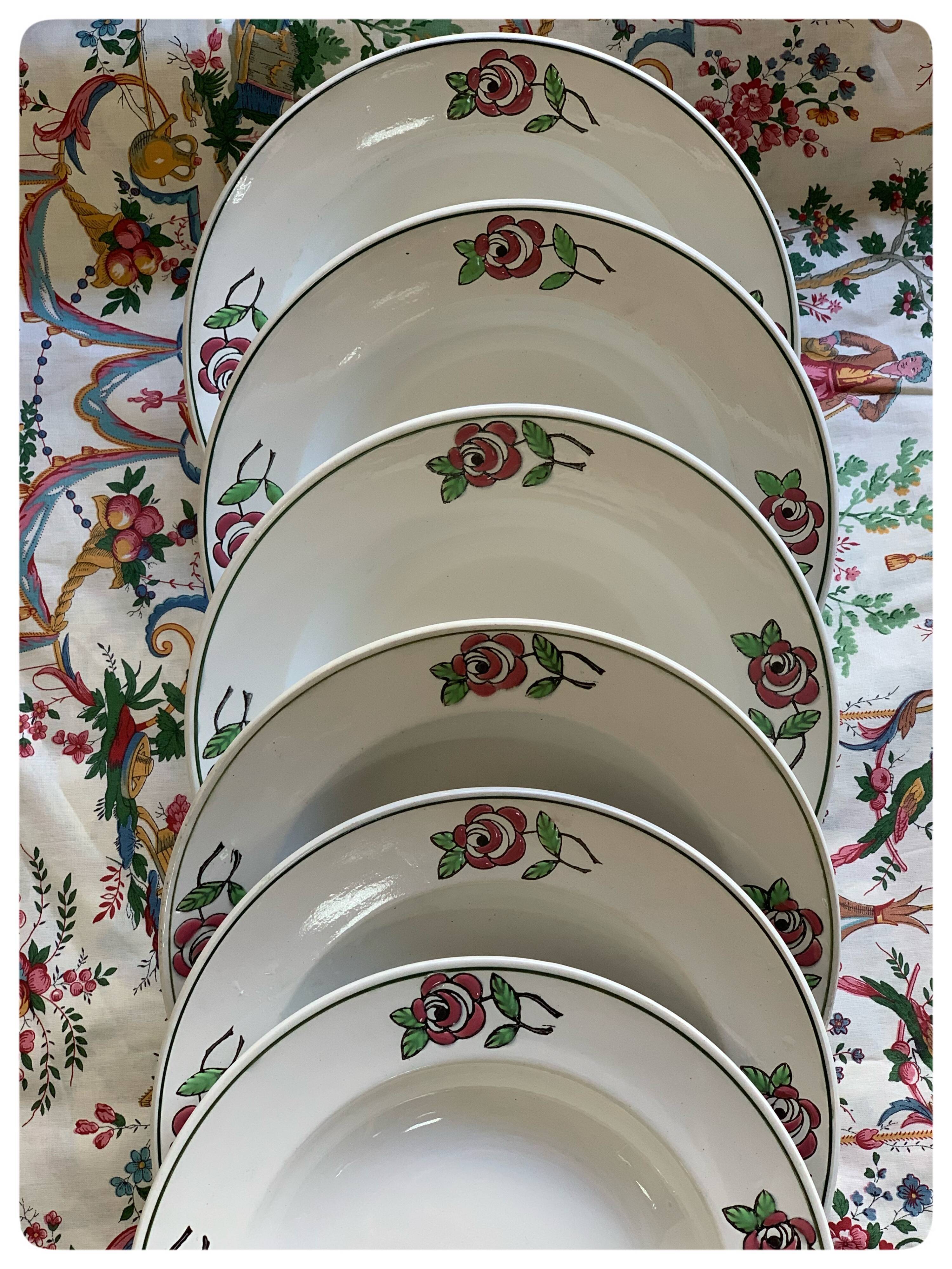 6 hollow earthenware plates, L'Amandinoise