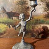 Old cherub candle holder