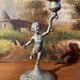 Old cherub candle holder