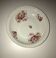 Hollow dish in fired porcelain with floral motifs
