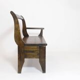 Handcrafted wooden bench with armrest and left drawer.