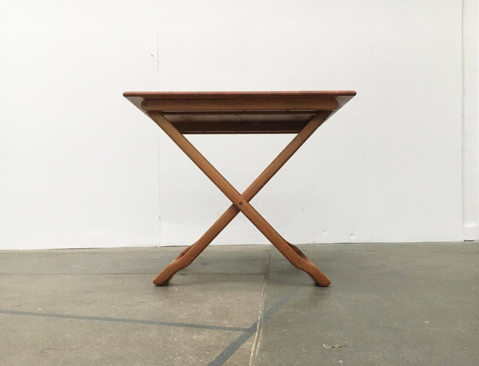 Danish folding table in teak from the mid-century by Juul Kristensen.