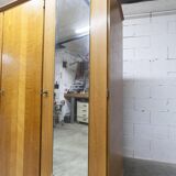 French wardrobe with tapered legs, 3 doors, 1 mirror (27*130), and 1 drawer.