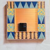 Enamelled lava mirror