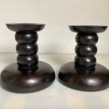 Pair of black stained wooden candlesticks