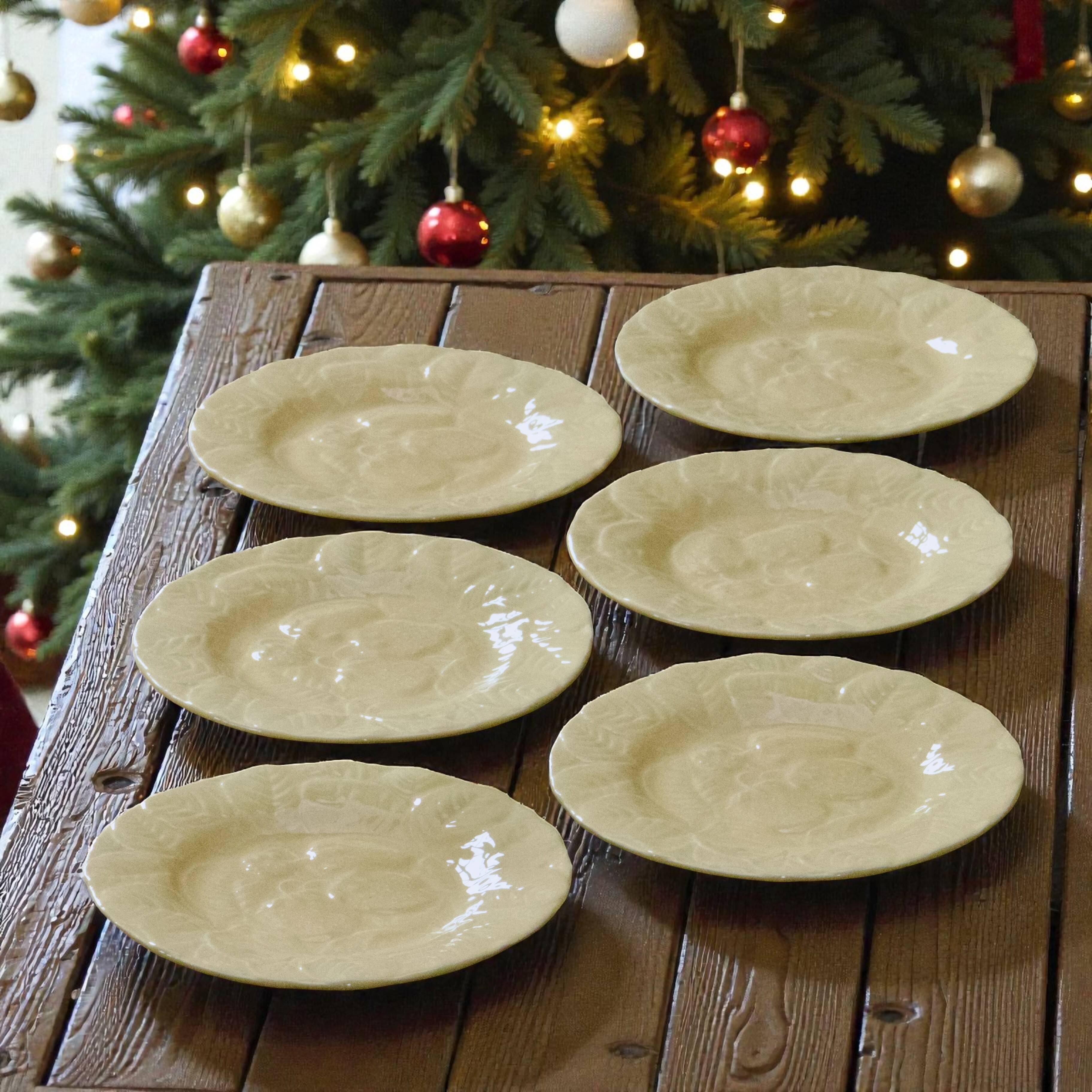 Yellow strawberry slipware plates signed Genevieve Lethu