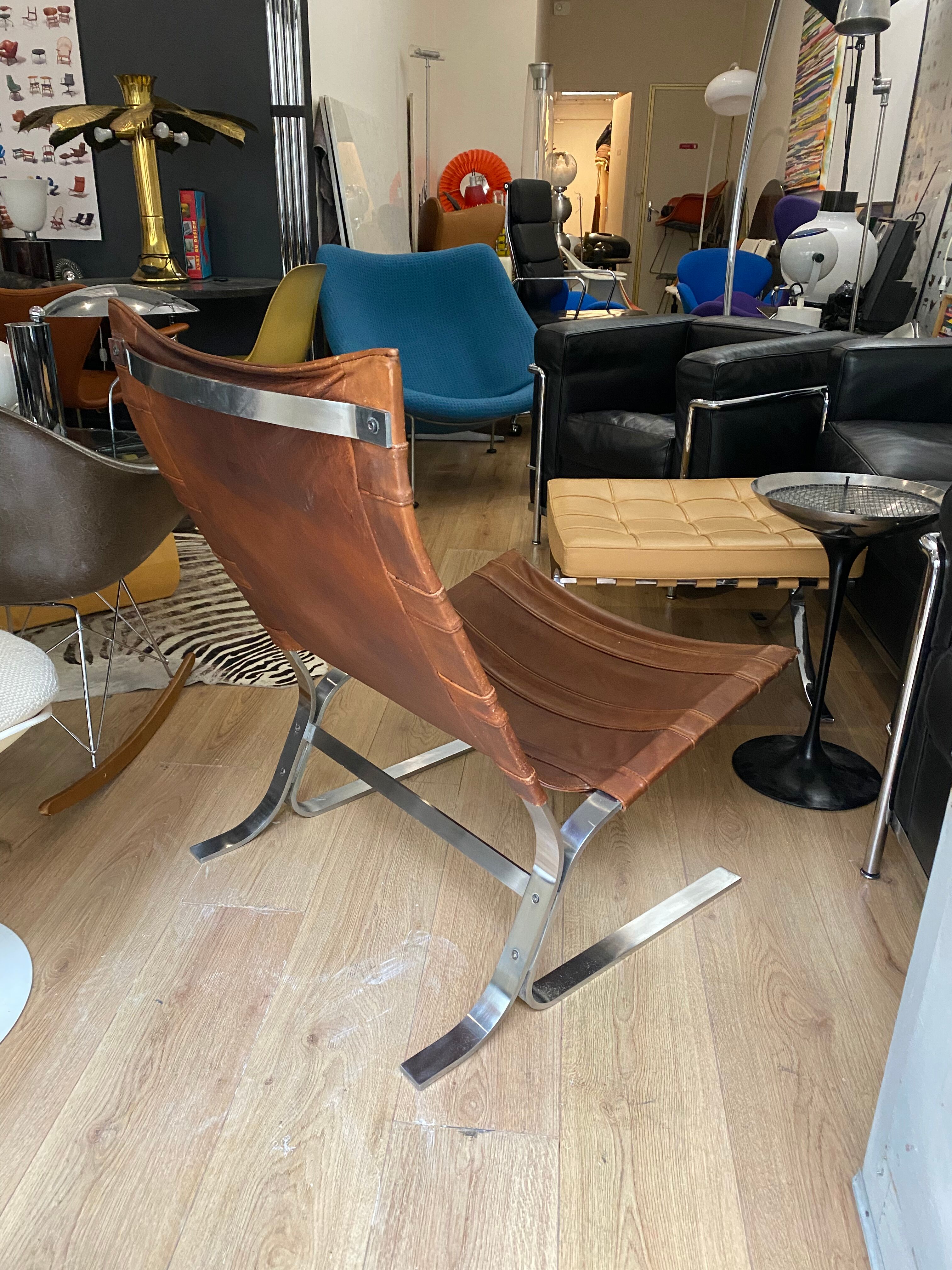 Vintage armchair design steel and leathers stretched 70s