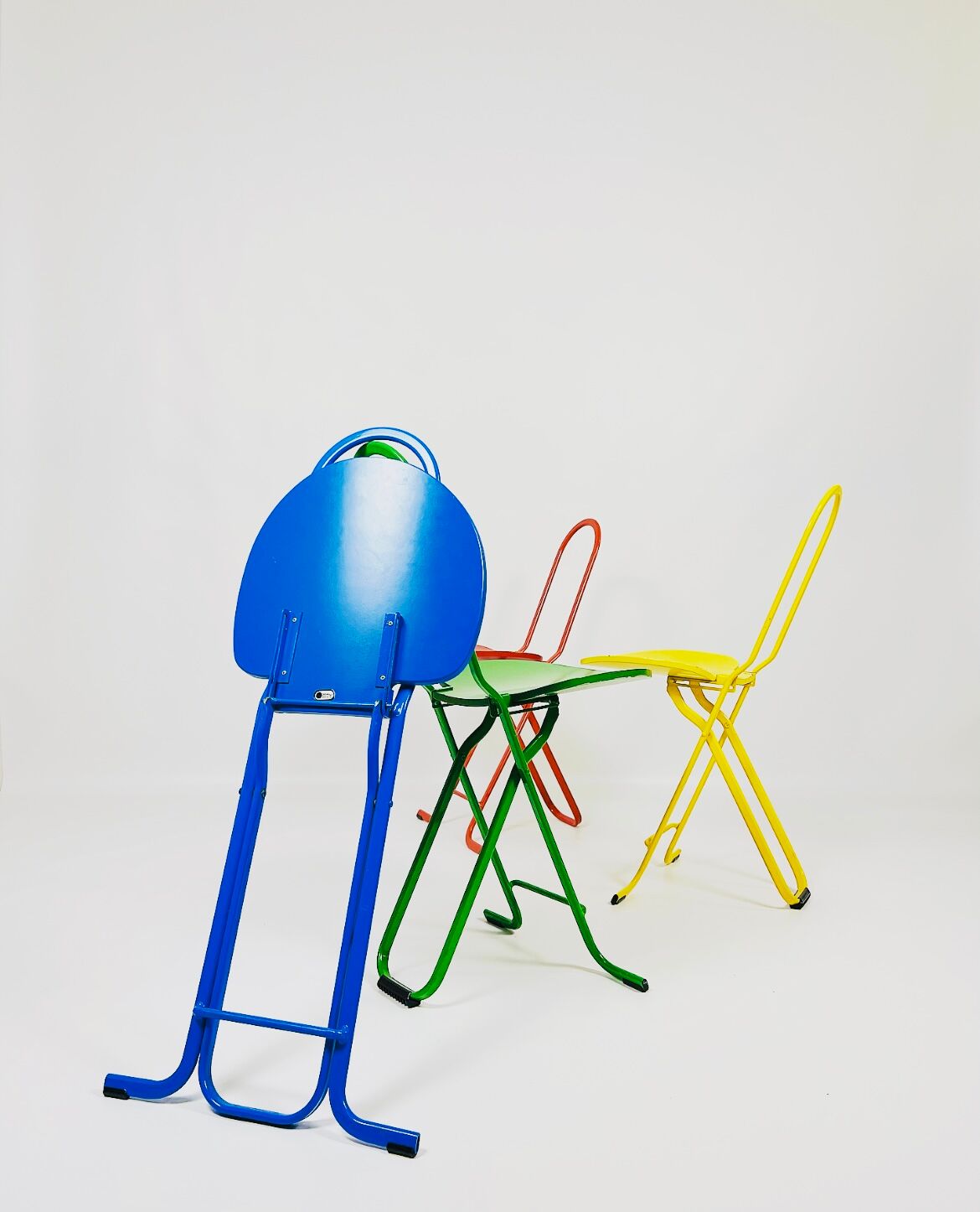 Dafne folding chair (colorful set) designed by Gastone Rinaldi