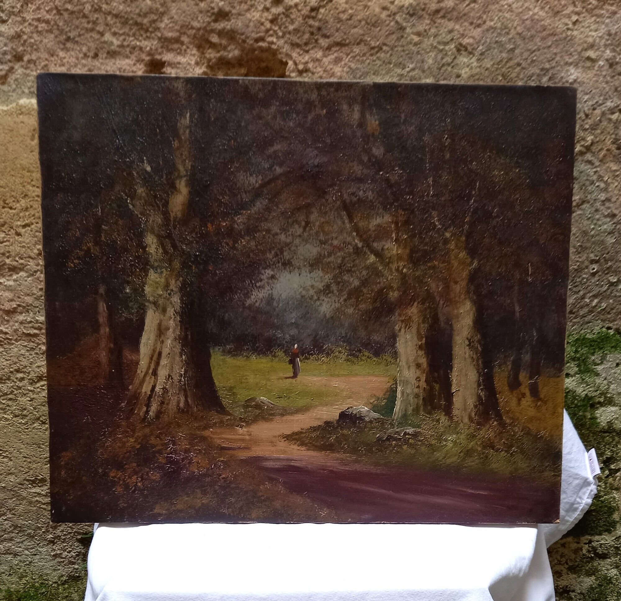 Old painting, oil on canvas representing a forest scene, early twentieth century
