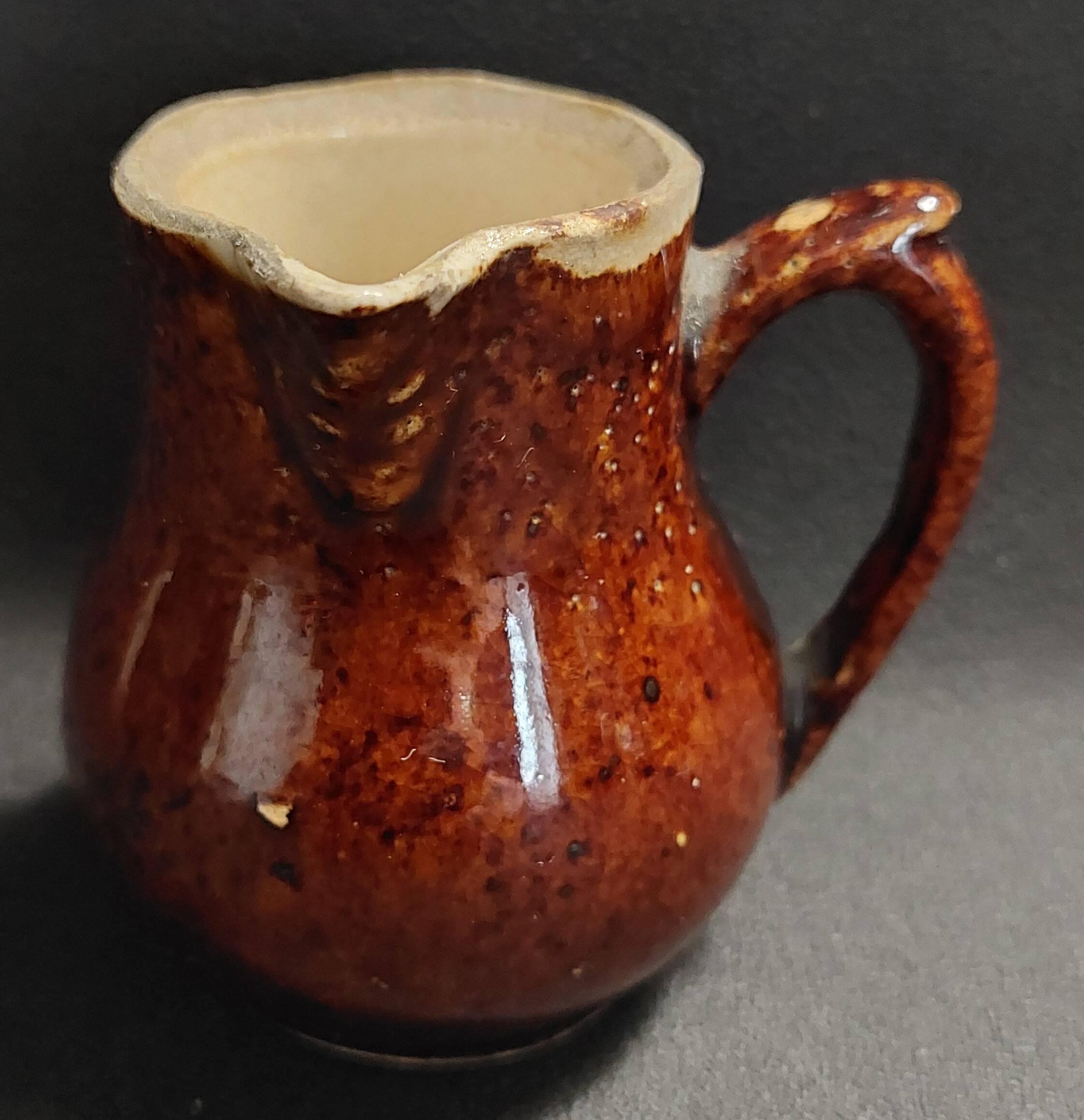 Early 20th century glazed stoneware cream pot