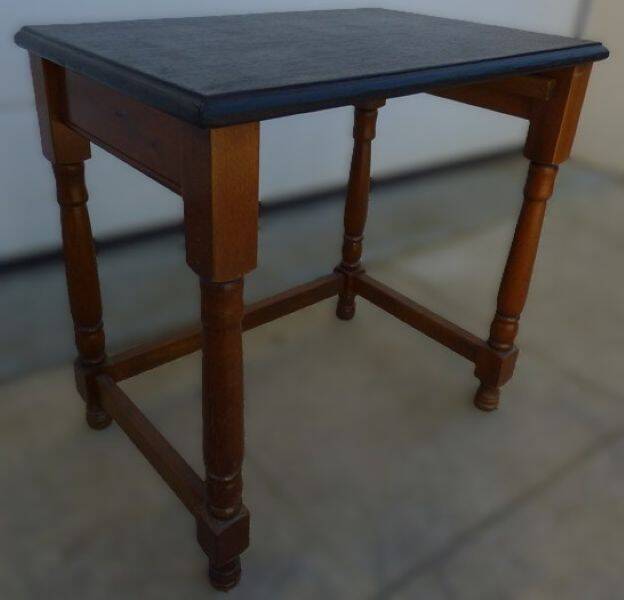 Nightstand or side table in solid wood with a black top.
