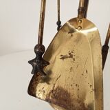 Old brass fireplace servant