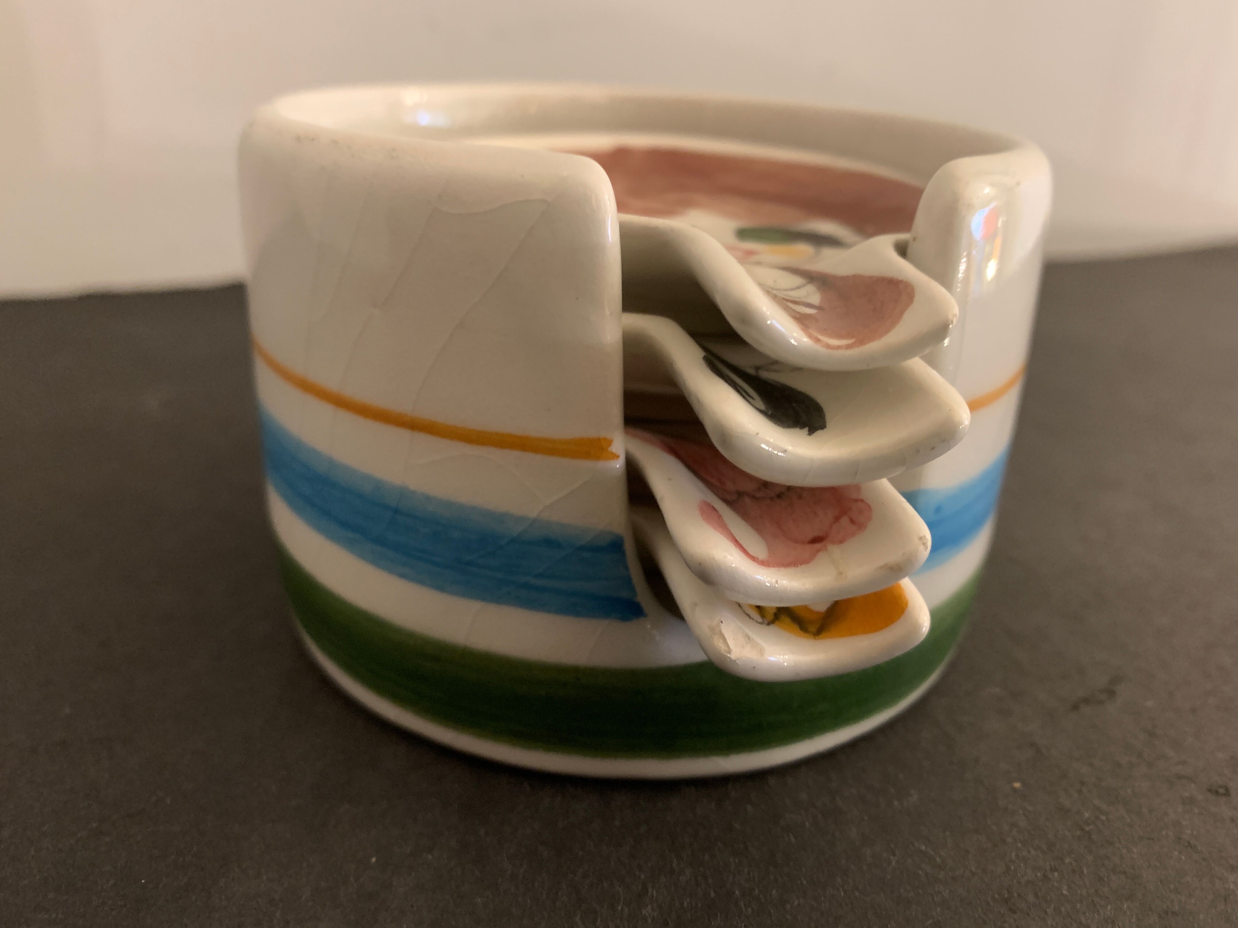 4 individual Italian ceramic stackable ashtrays with women's faces