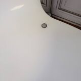 White plexiglass chair