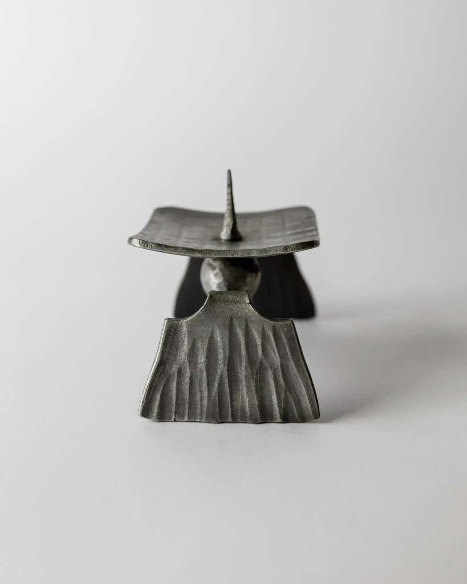 Vintage brutalist iron candlestick from the 1970s.