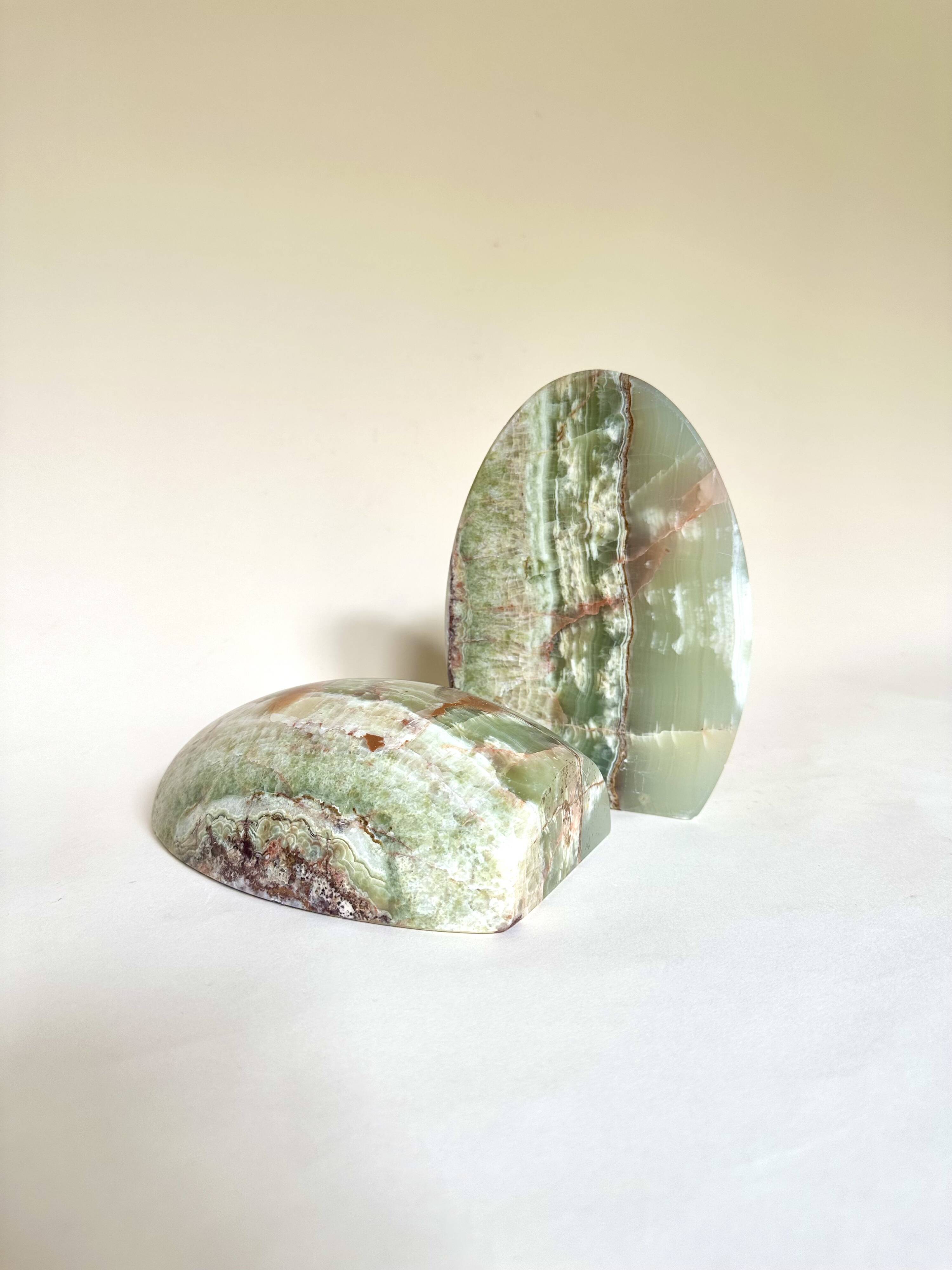 Pair of "egg" bookends in green onyx.
