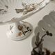 Haviland service, plates, pedestal dishes and soup tureen.