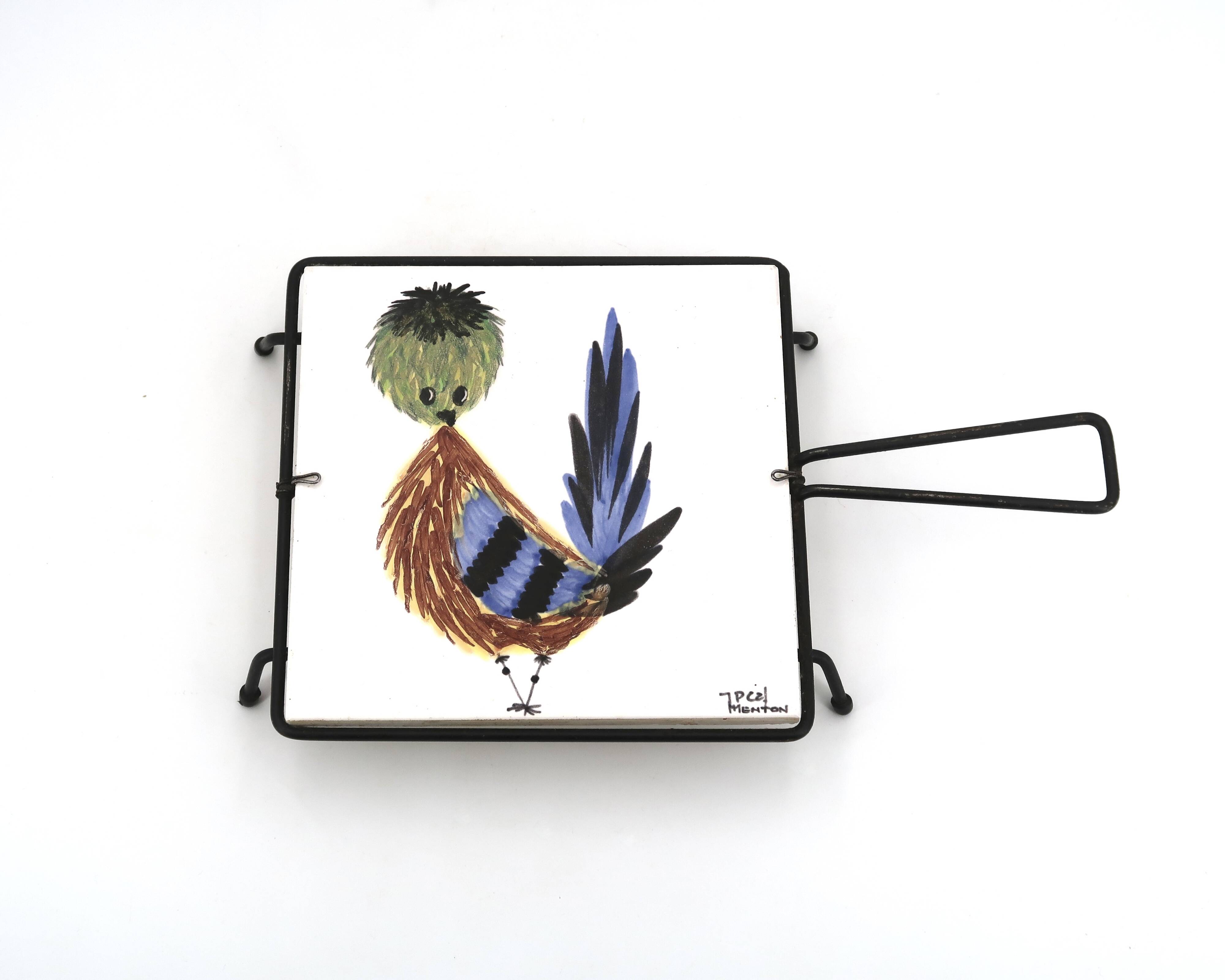 Square ceramic trivet with a bird by Jean Pierre Caffarelli.