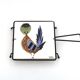 Square ceramic trivet with a bird by Jean Pierre Caffarelli.