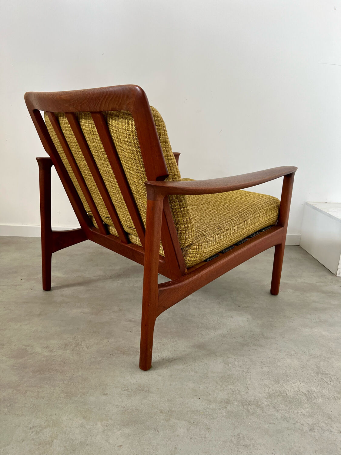 Old Scandinavian design armchair in vintage teak year 60