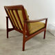 Old Scandinavian design armchair in vintage teak year 60