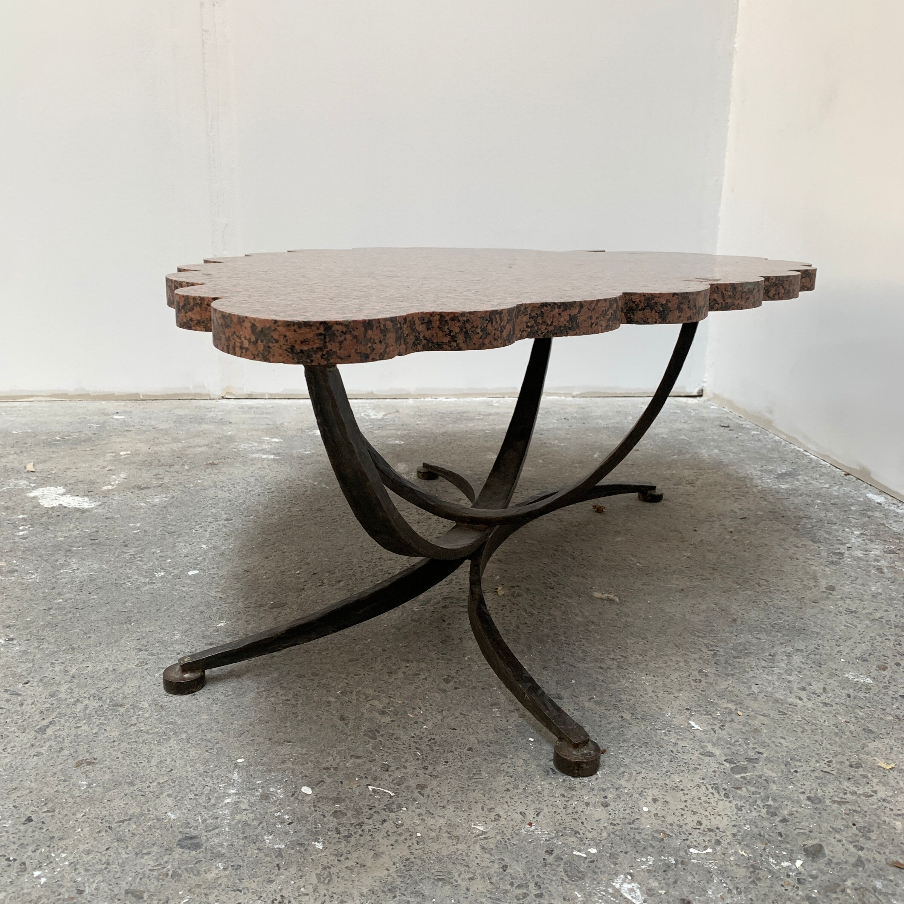 Granite and hammered wrought iron coffee table