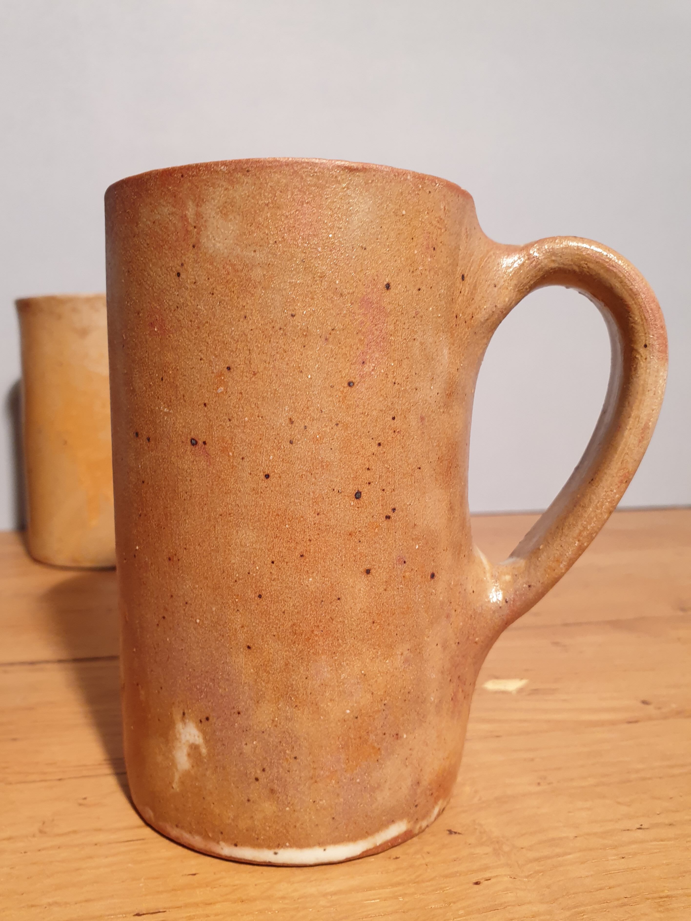 Set of three large sandstone mugs