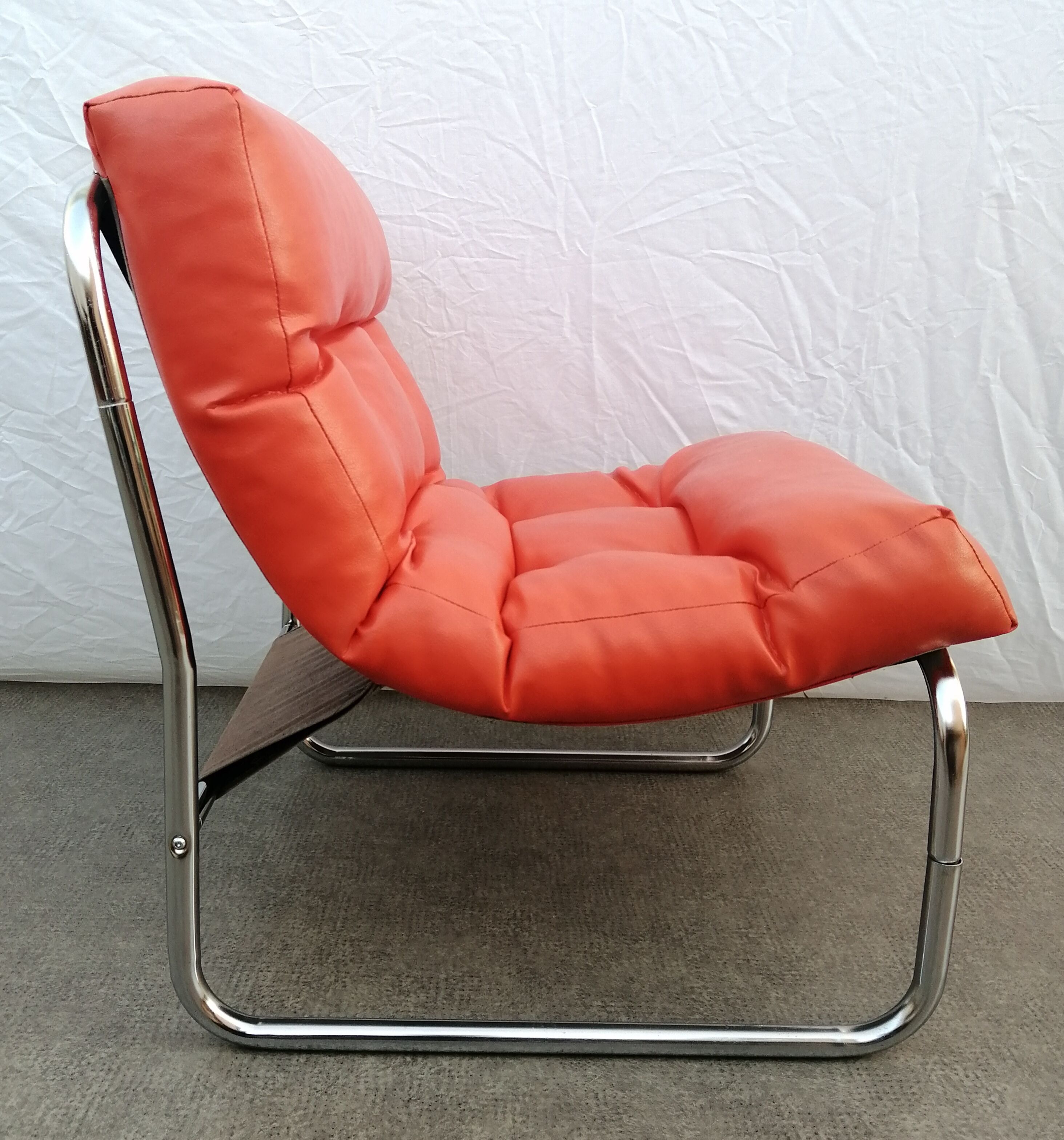 Orange pixi model armchair designed for Ikea by designer Gillis Lundgren 1970