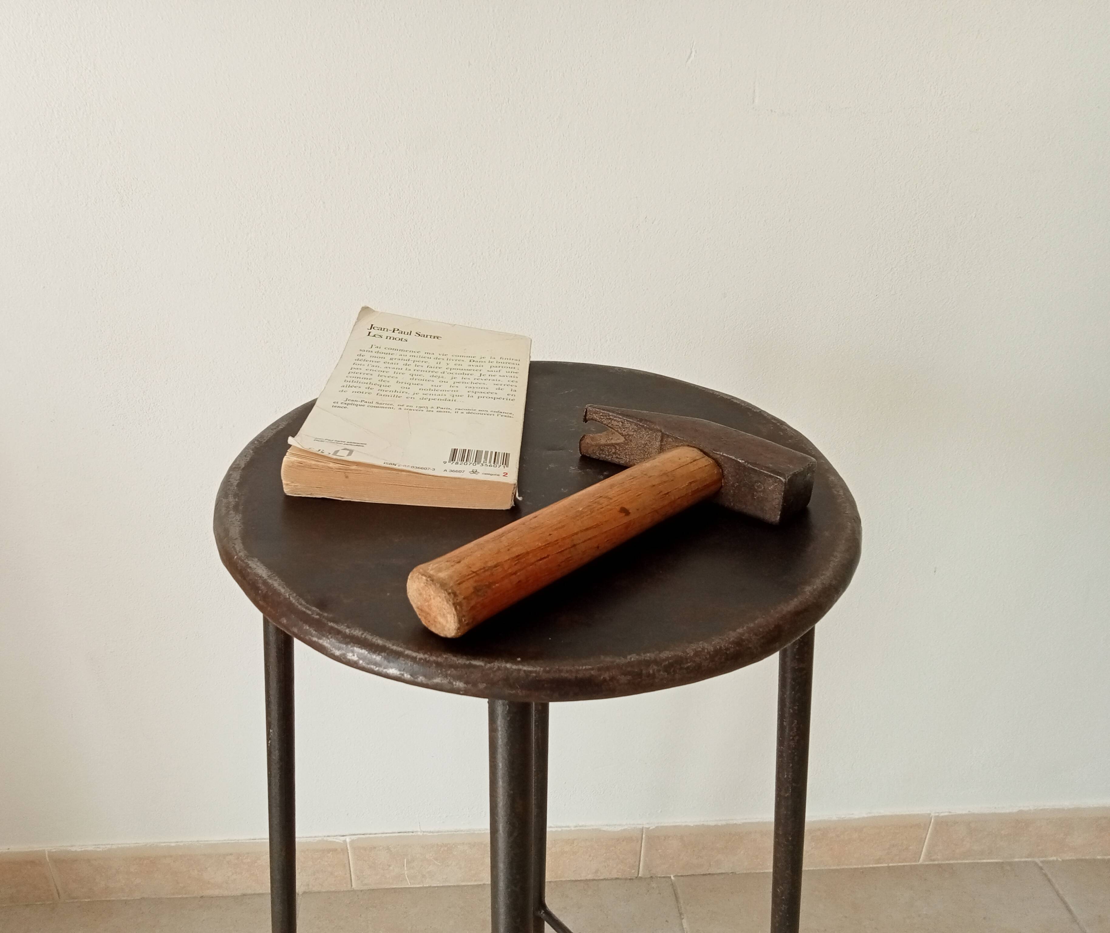 Brutalist high stool from the 1960s in solid steel.