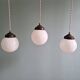 Art Deco trio of suspensions in white opaline, 1930s