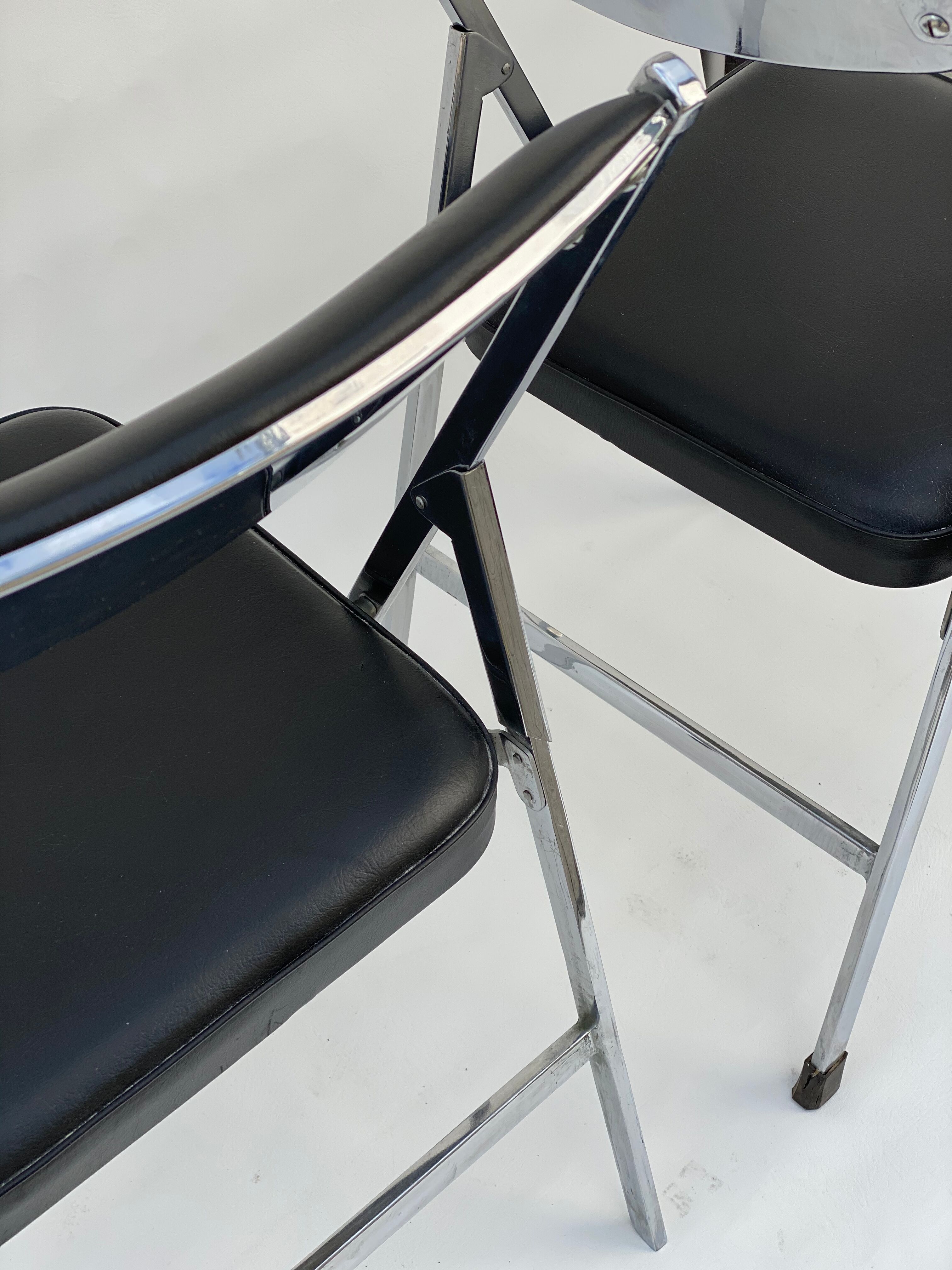 Pair of italian chrome and leather folding chairs