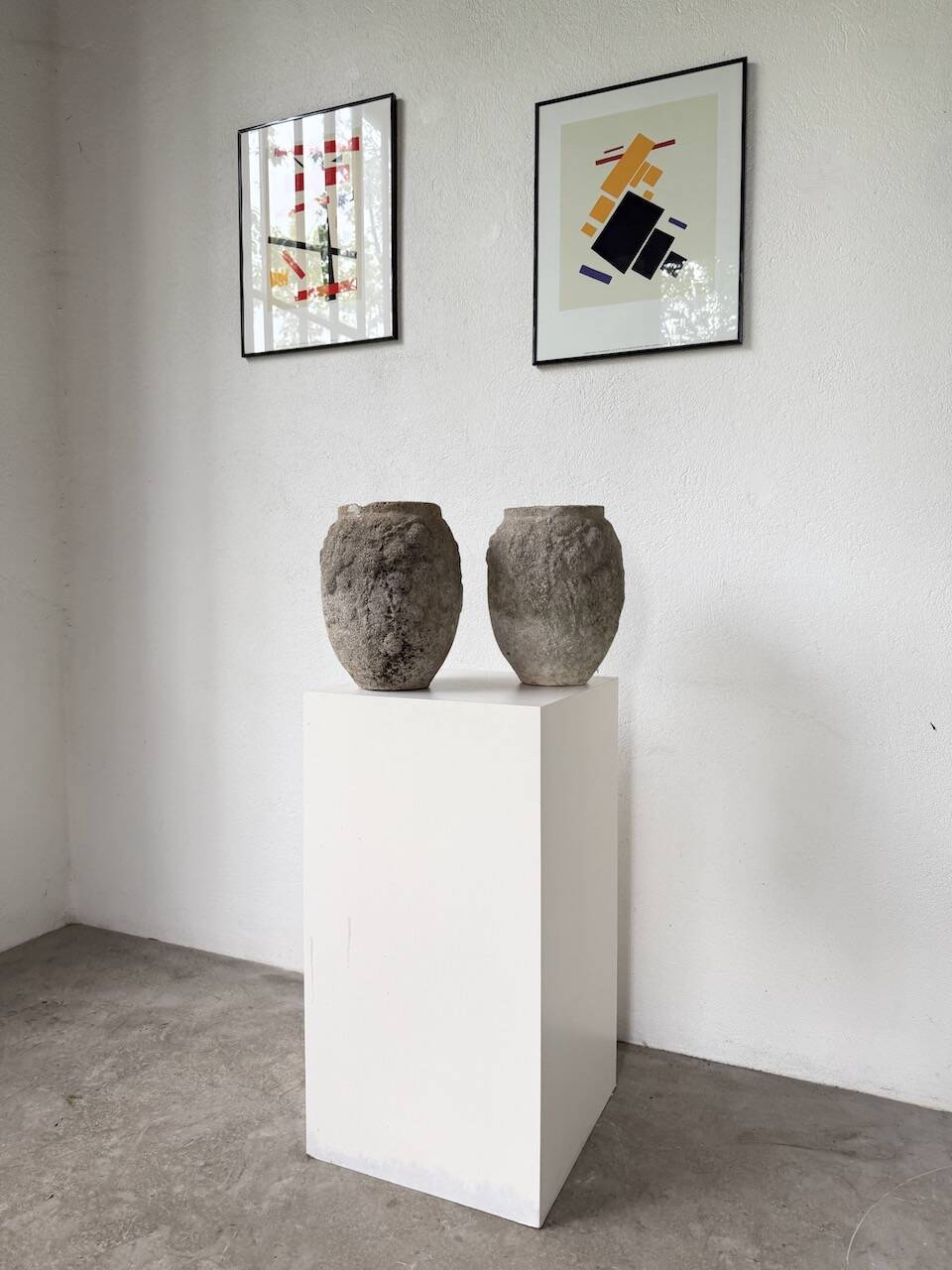 Pair of cement planters, 1900