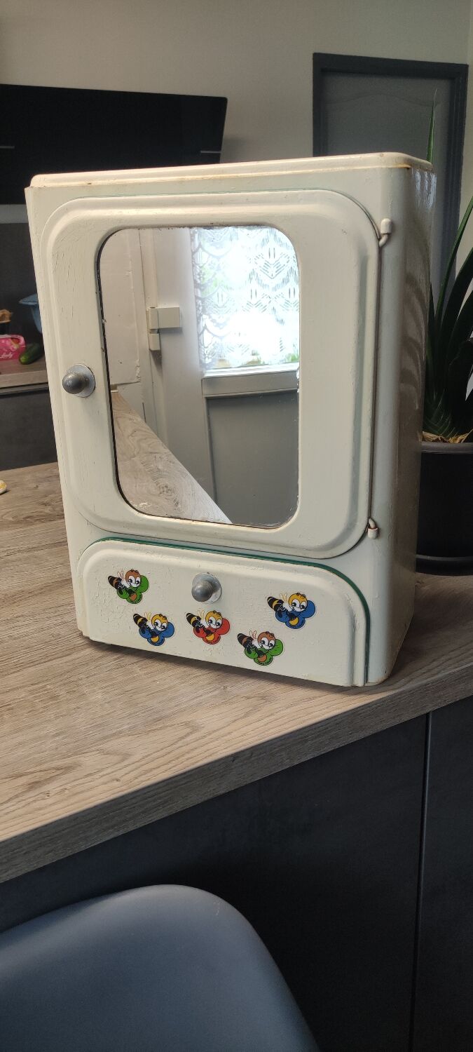 Vintage sheet metal medicine cabinet