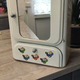Vintage sheet metal medicine cabinet