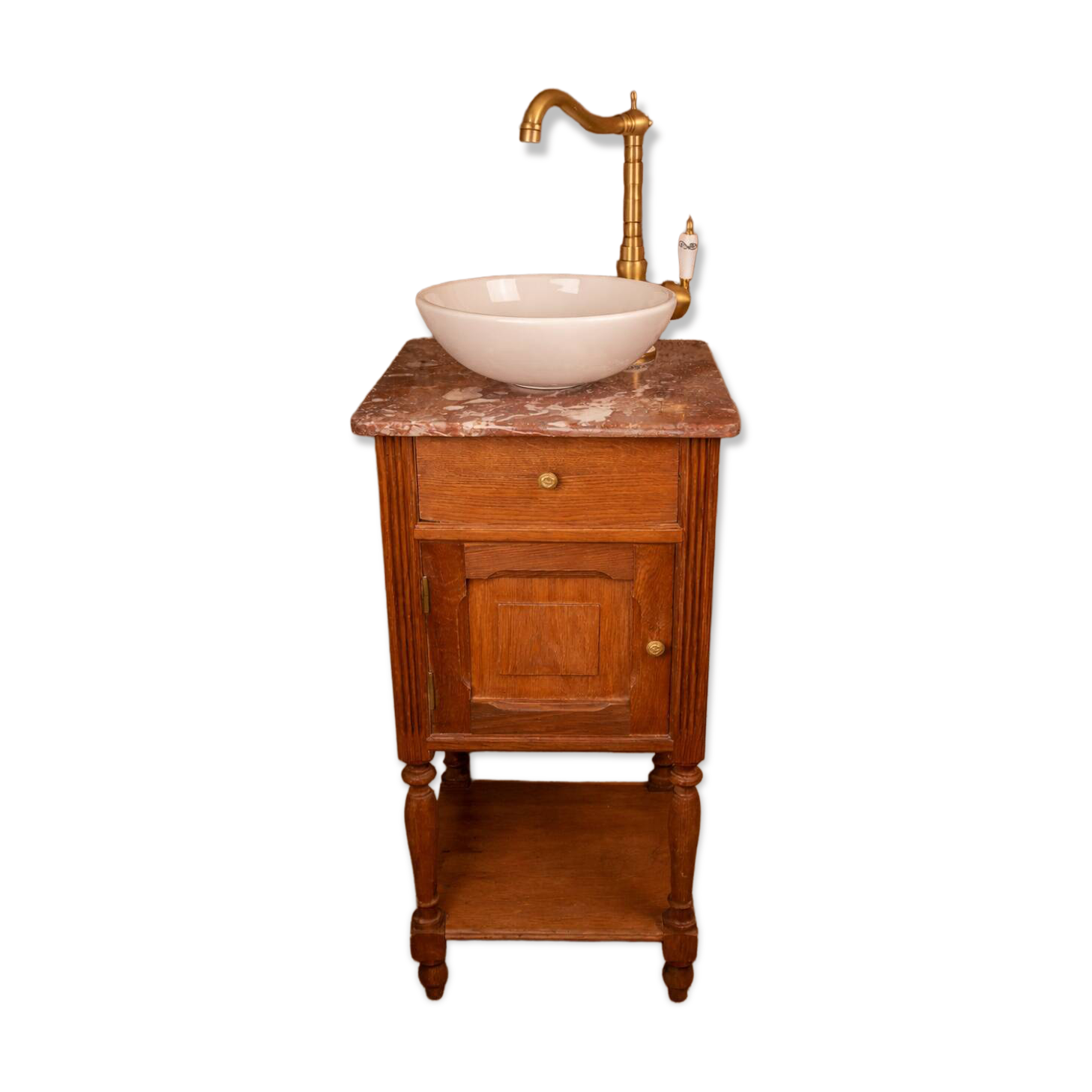 Washbasin made from a bedside table.