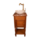 Washbasin made from a bedside table.