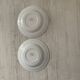 White and pastel yellow Amandinoise plates