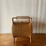 Large vintage rattan and wicker sewing basket with floral decor seat