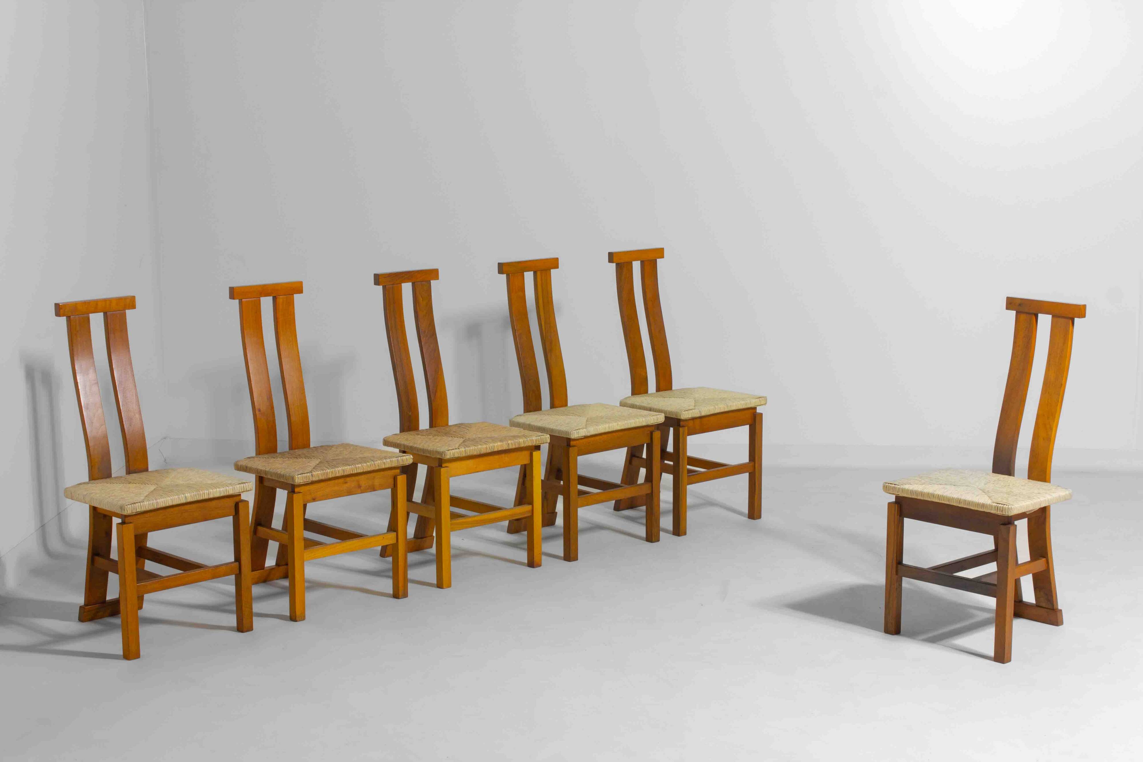Sculptural postmodern dining chairs in wood with curved back, 1980s